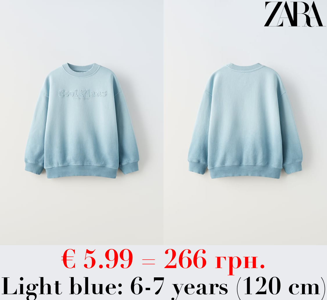 SWEATSHIRT WITH SLOGAN PATCH