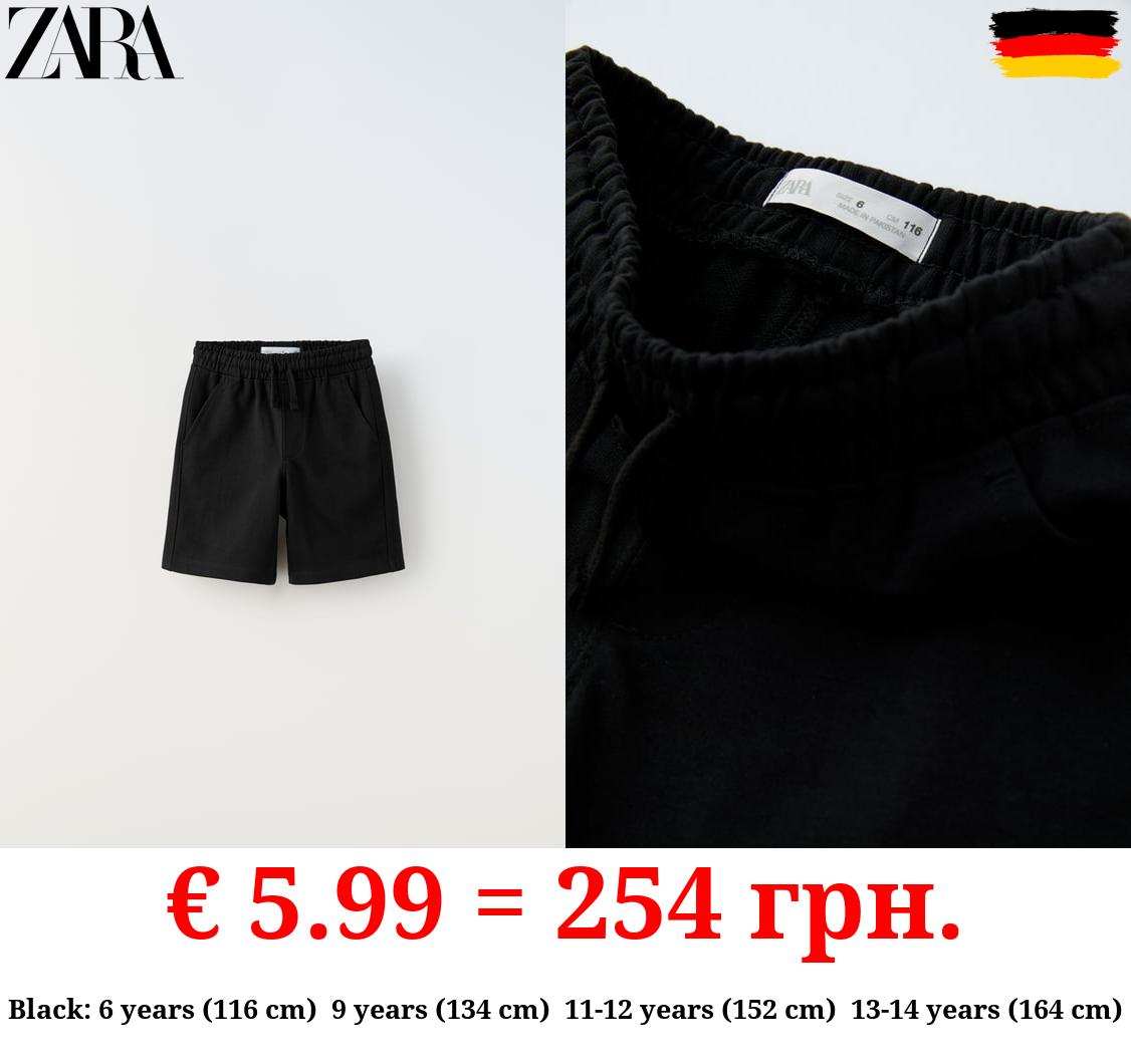 PLUSH BERMUDA SHORTS