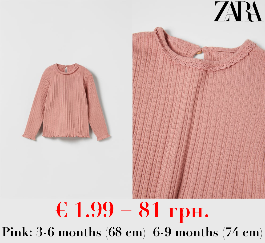 OPEN KNIT TOP WITH LACE TRIM