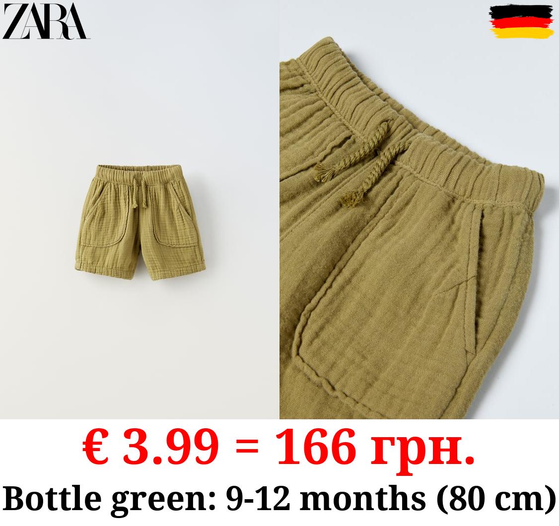 TEXTURED DRAWSTRING BERMUDA SHORTS