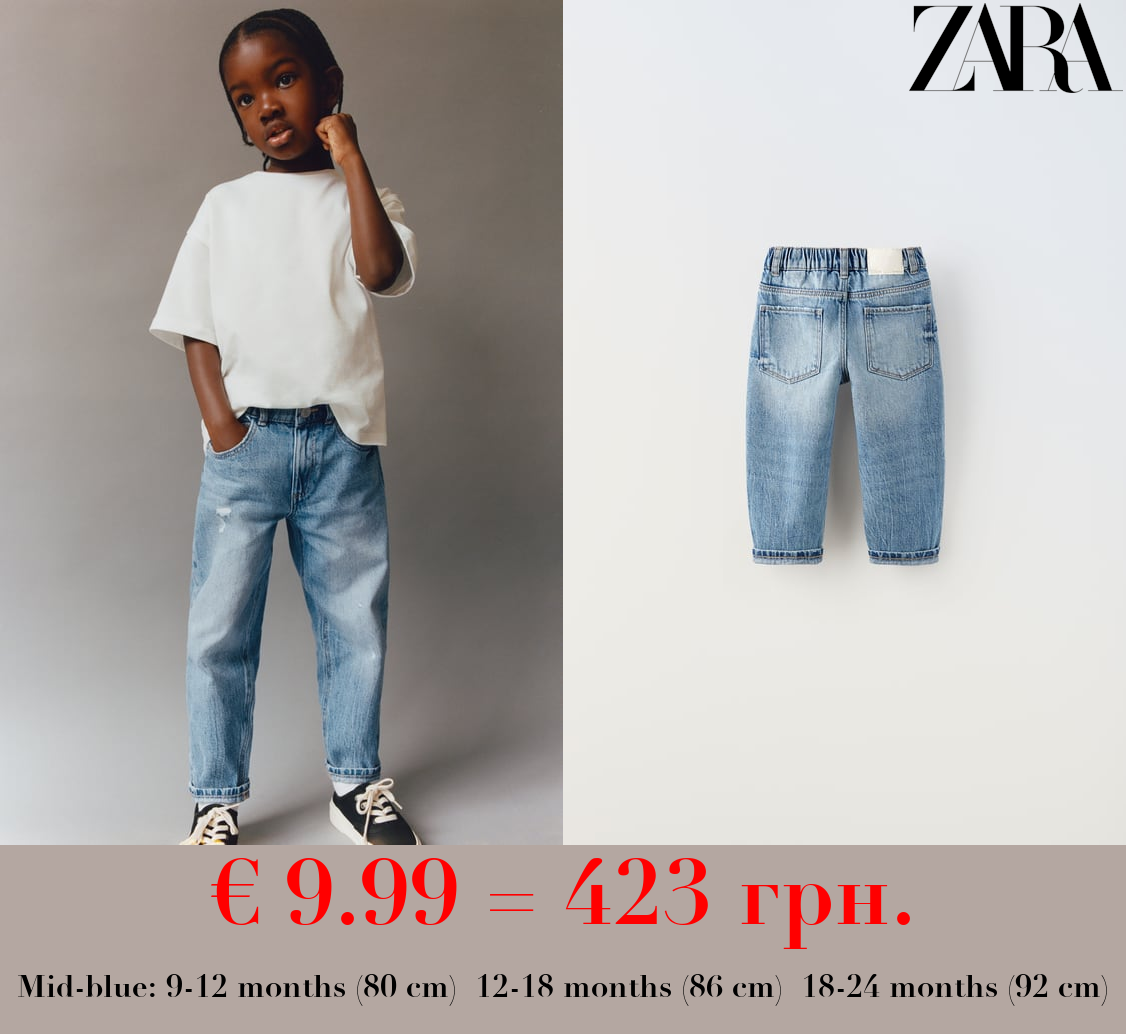 LOW FIT RIPPED JEANS