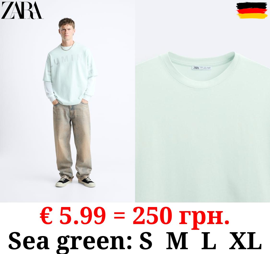 T-SHIRT WITH SUNLIGHT-REACTIVE SLOGAN