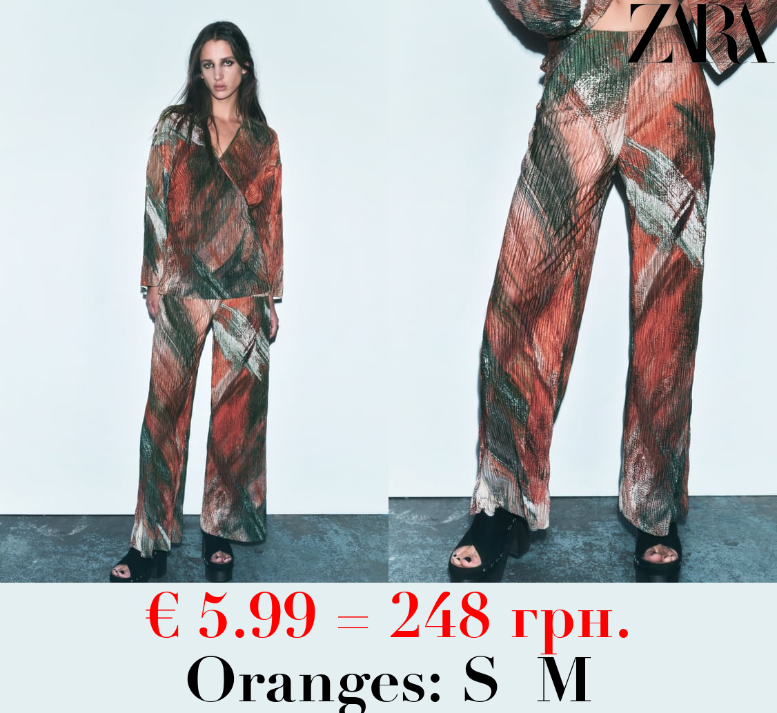 PLEATED PRINTED TROUSERS