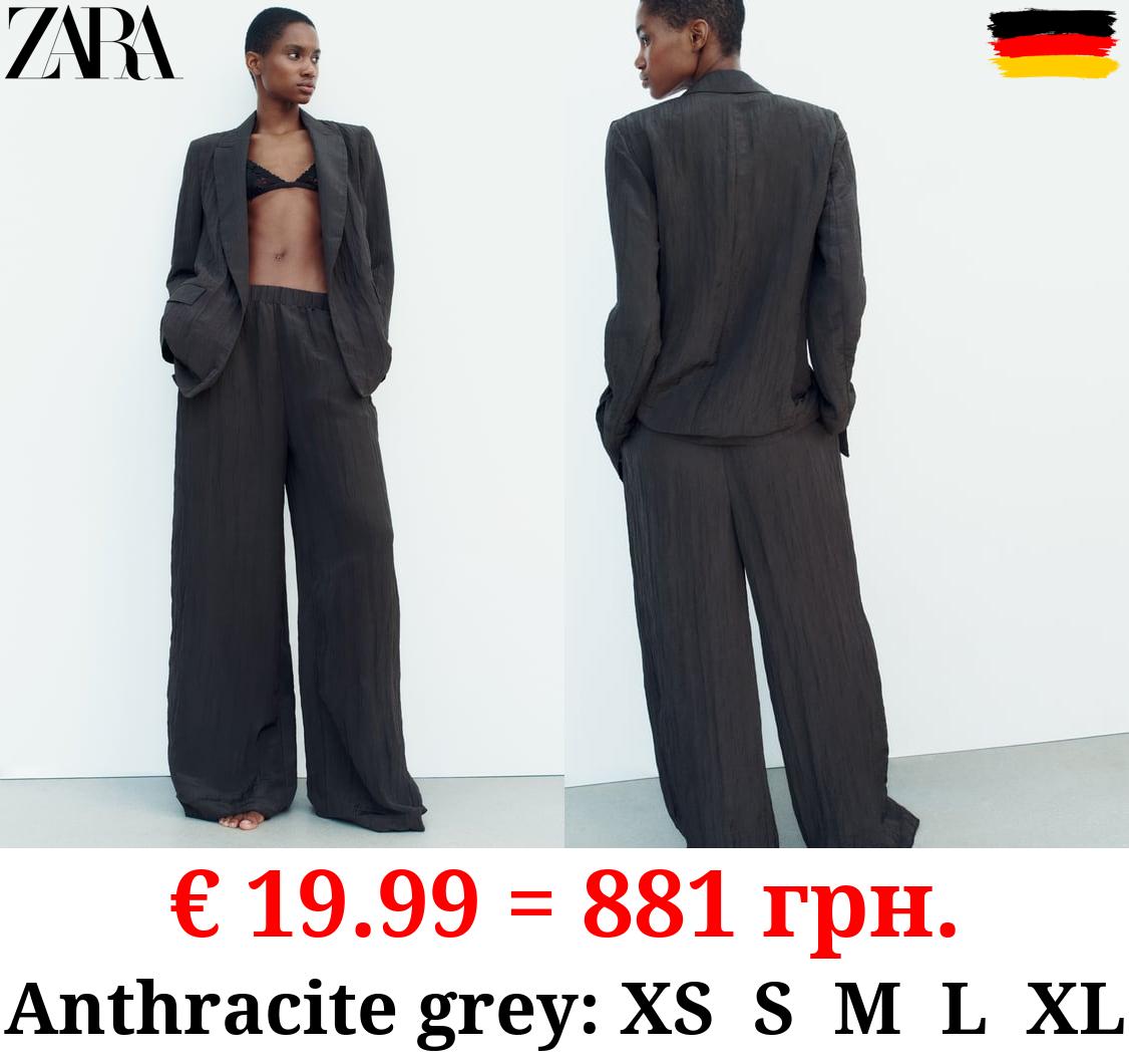CREASED-EFFECT PALAZZO TROUSERS