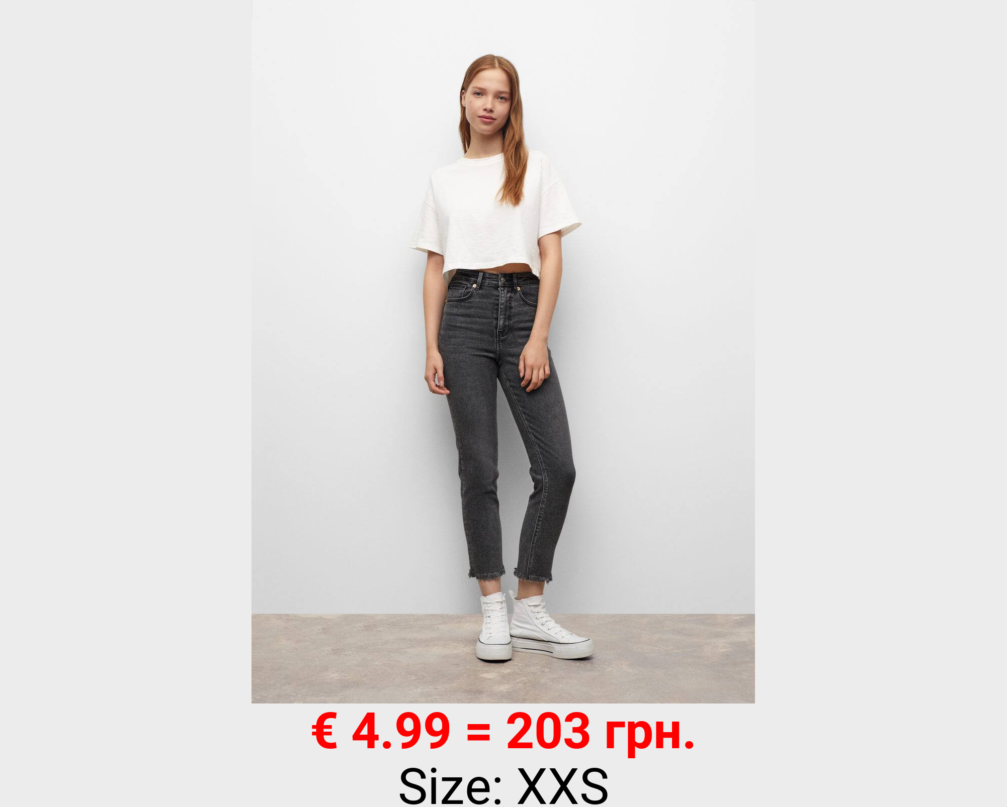 Jeans slim bajo deshilachado