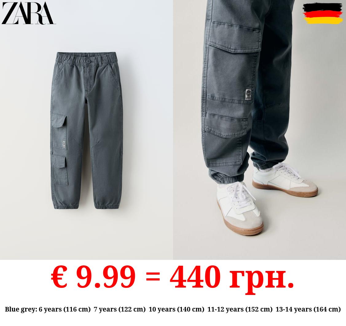 CANVAS TROUSERS WITH POCKETS