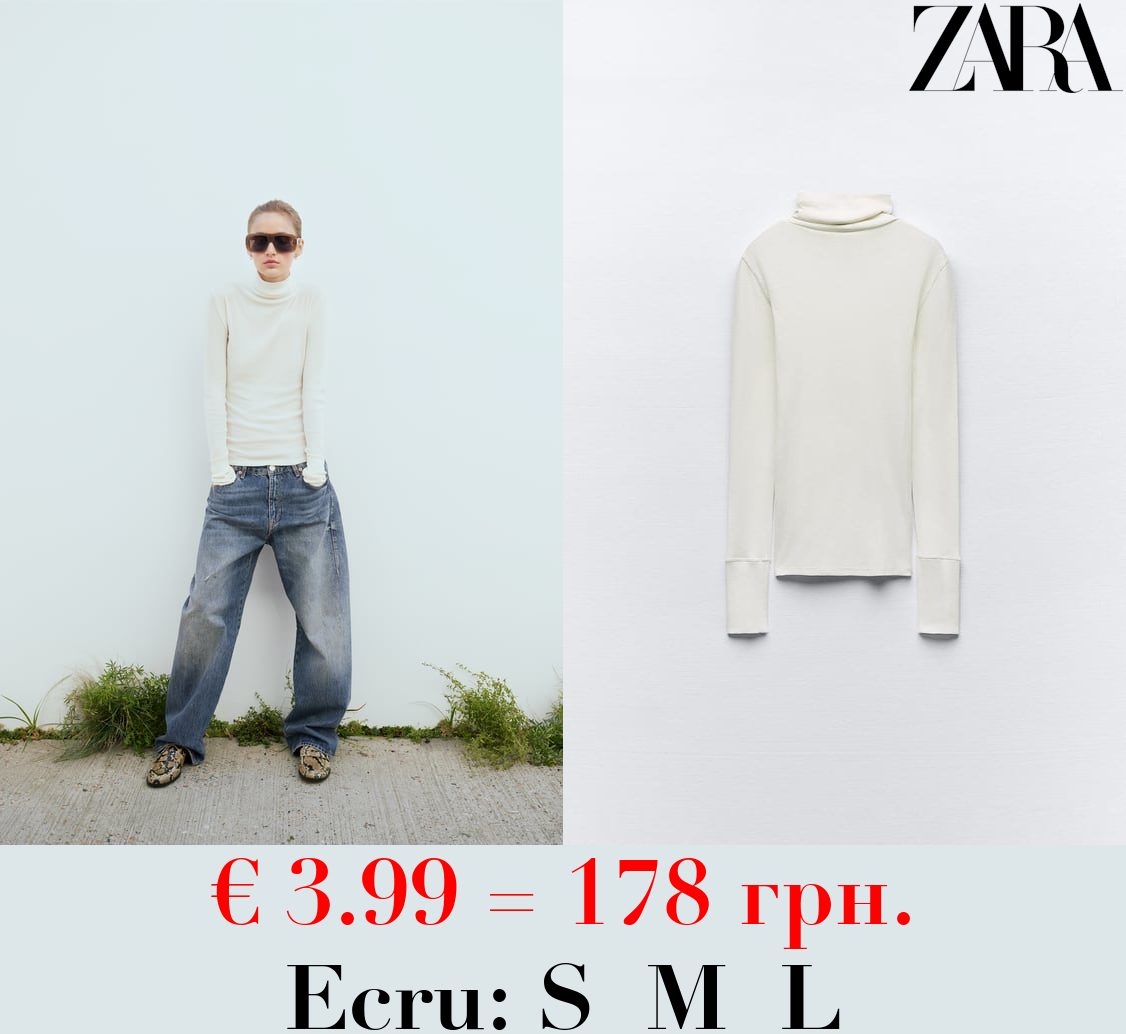 SEMI-SHEER DELICATE COTTON TOP WITH CUFFS AND SEAM DETAIL