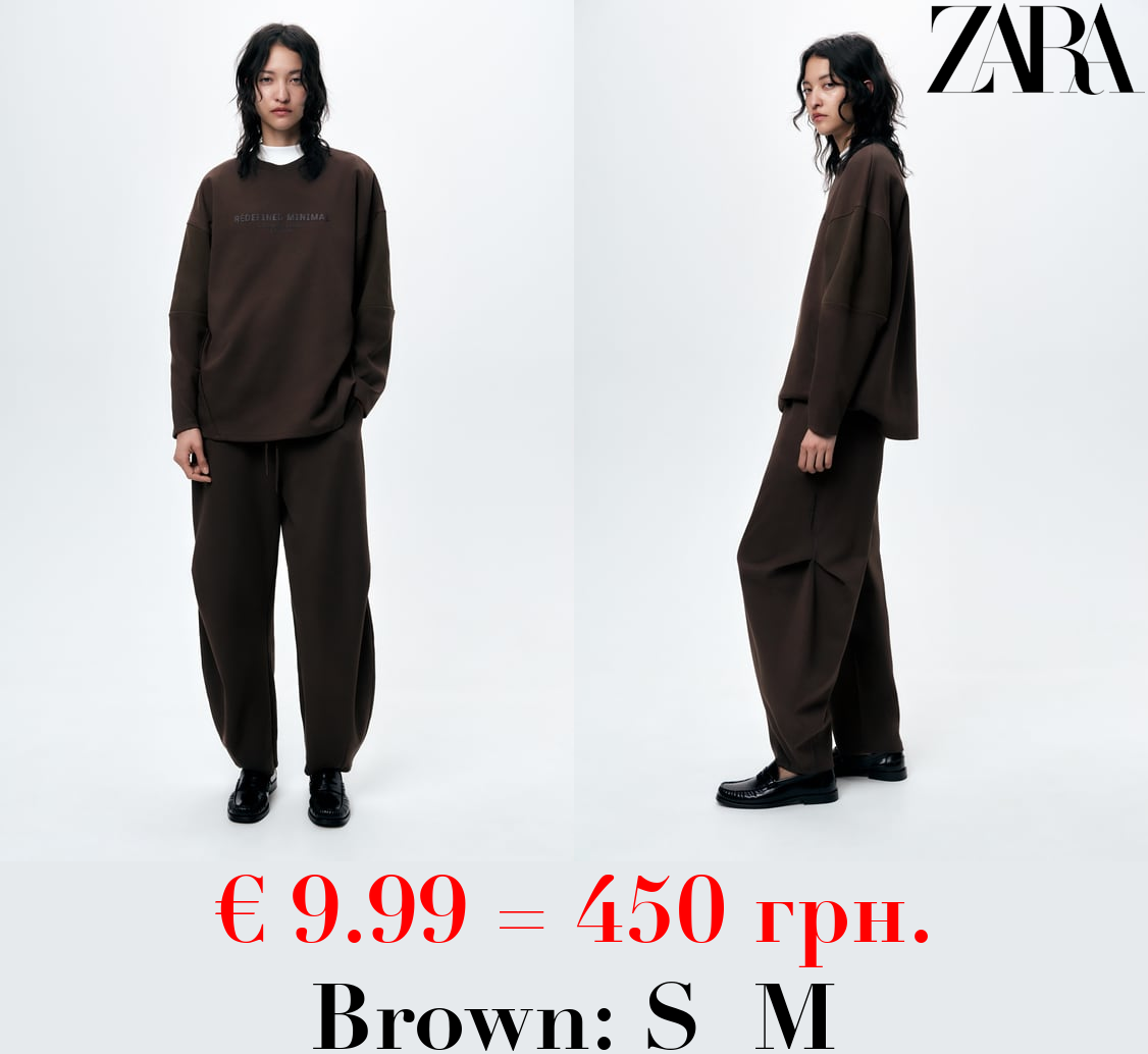 PLUSH JOGGER TROUSERS WITH PLEATS