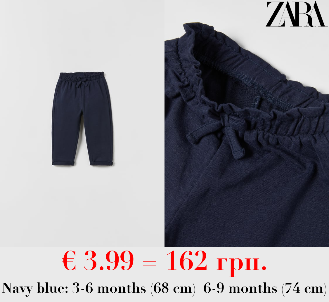 BOHO-STYLE TROUSERS WITH BOW