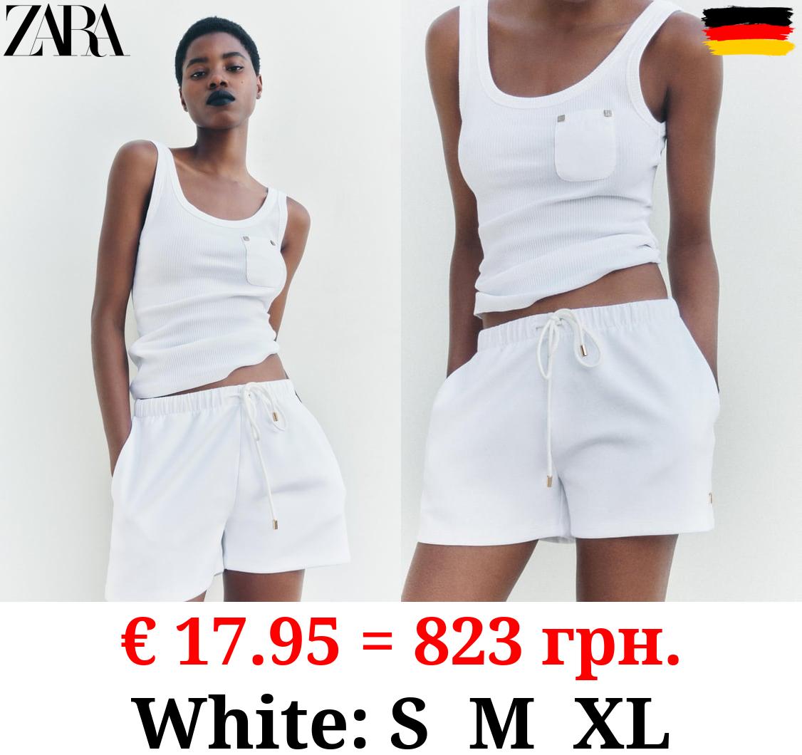 RIBBED T-SHIRT WITH POCKET