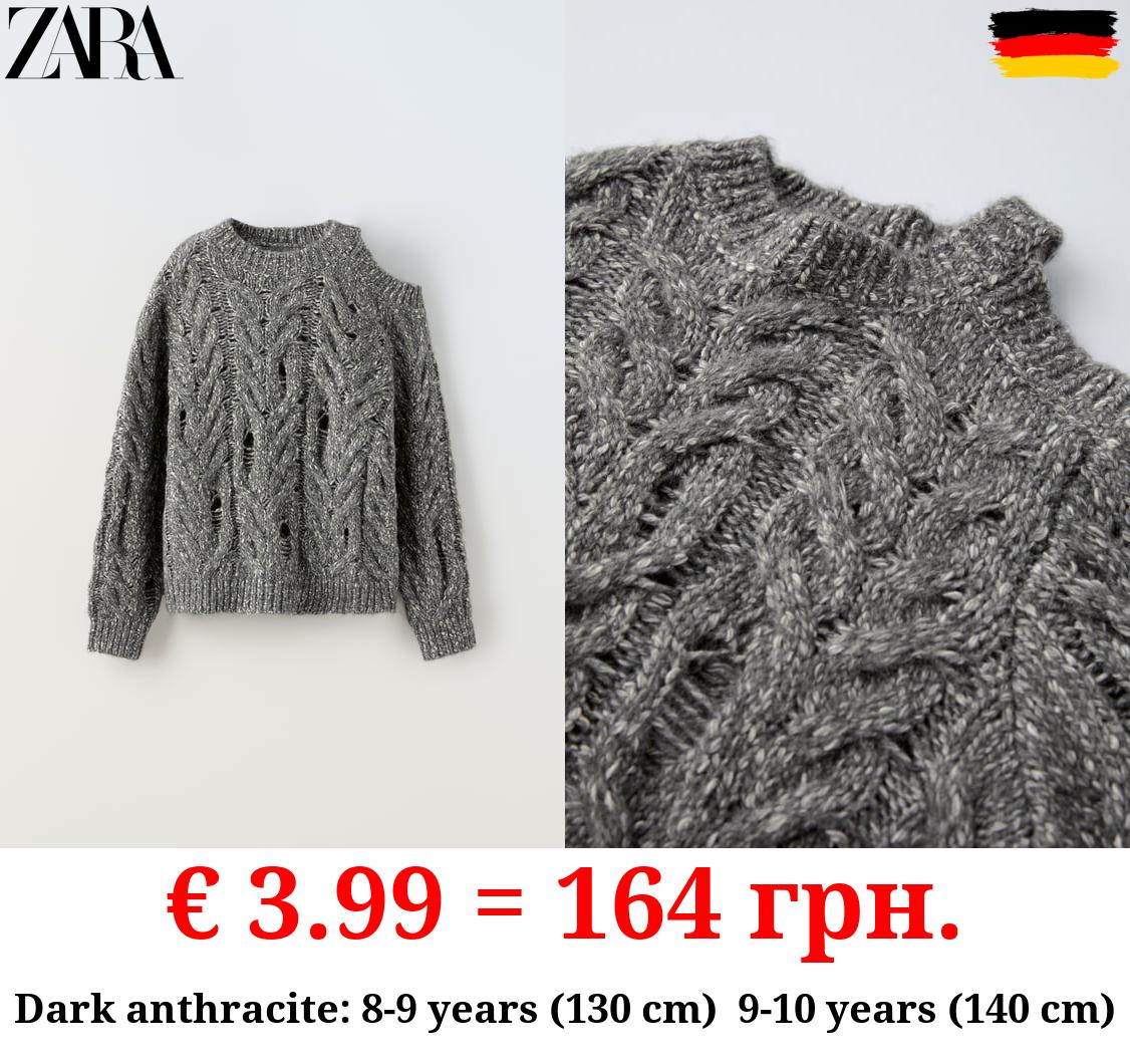 CUT-OUT CABLE-KNIT SWEATER