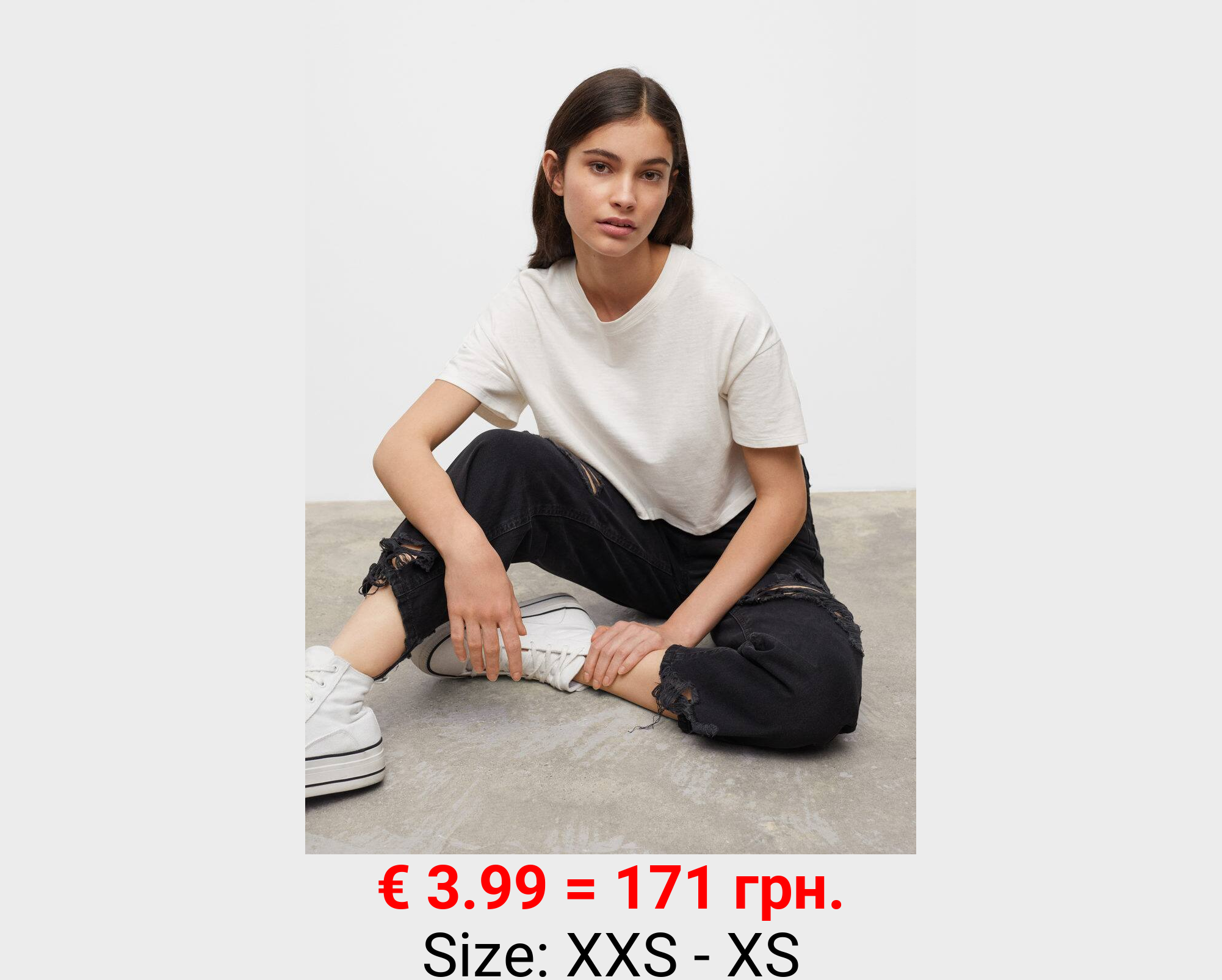 Jeans rectos bajo deshilachado