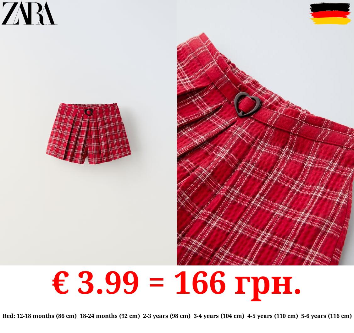 CHECK BERMUDA SHORTS WITH BOX PLEAT DETAIL