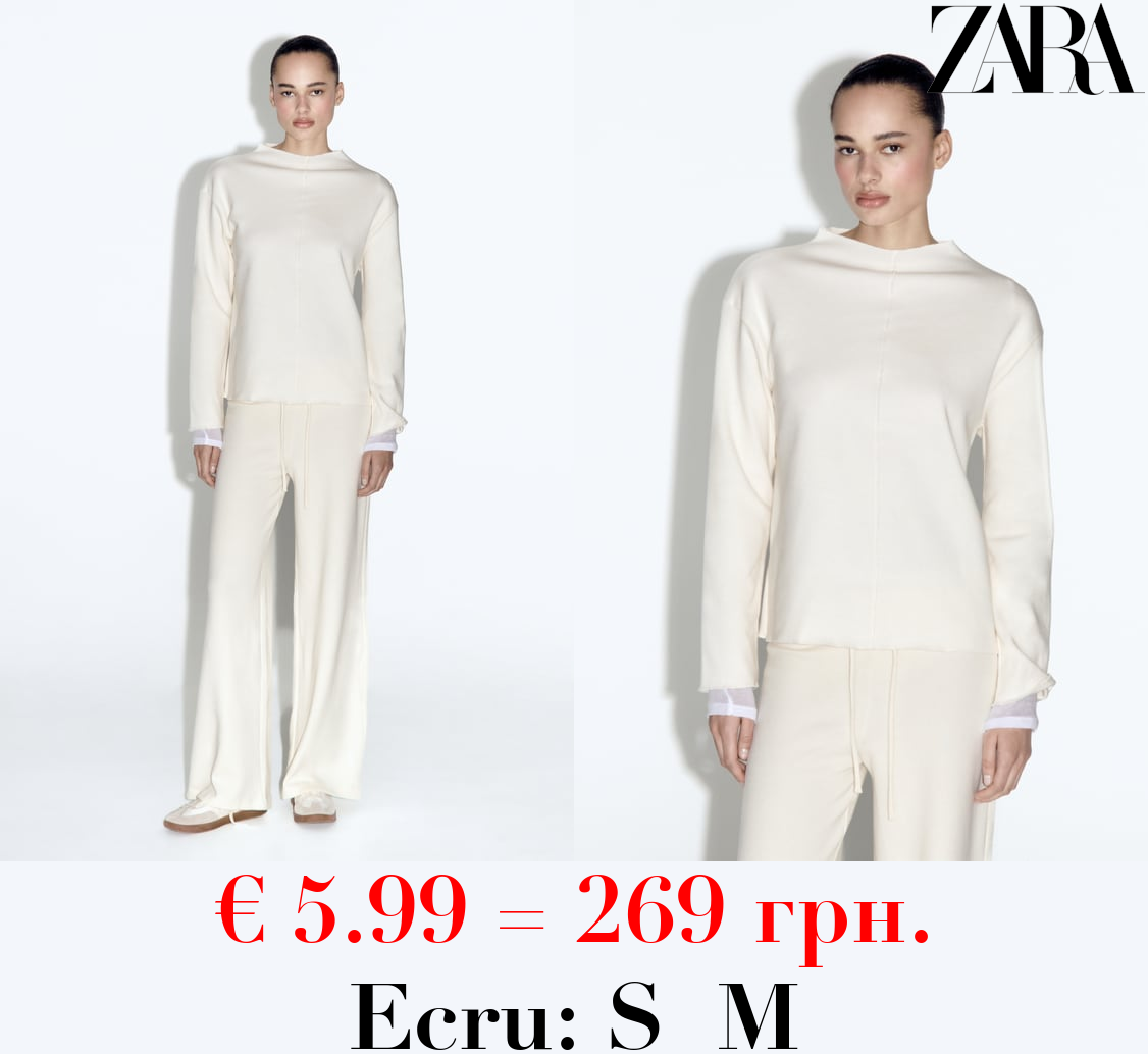 SOFT SWEATER WITH FRONT SEAM