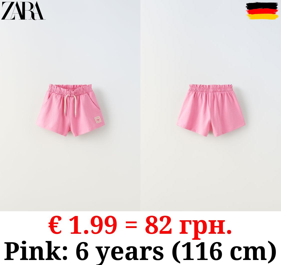 PLUSH BERMUDA SHORTS WITH LABEL DETAIL