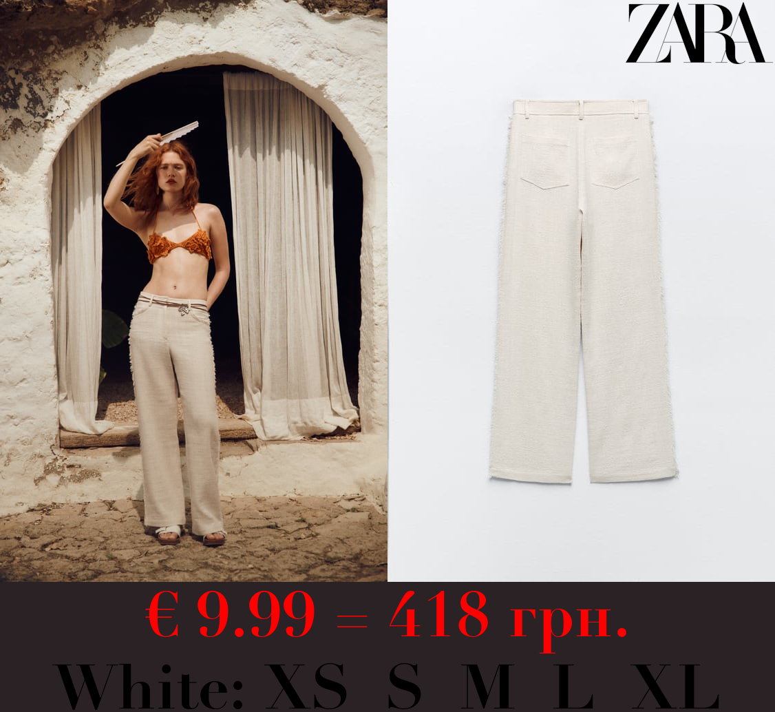 WIDE-LEG FRAYED TROUSERS