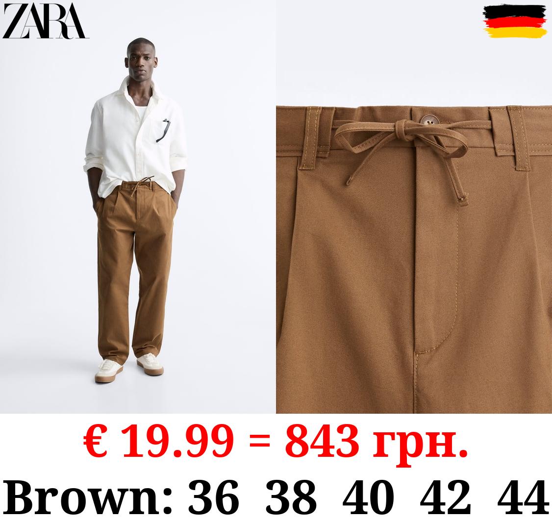 PLEATED TROUSERS WITH DRAWSTRING