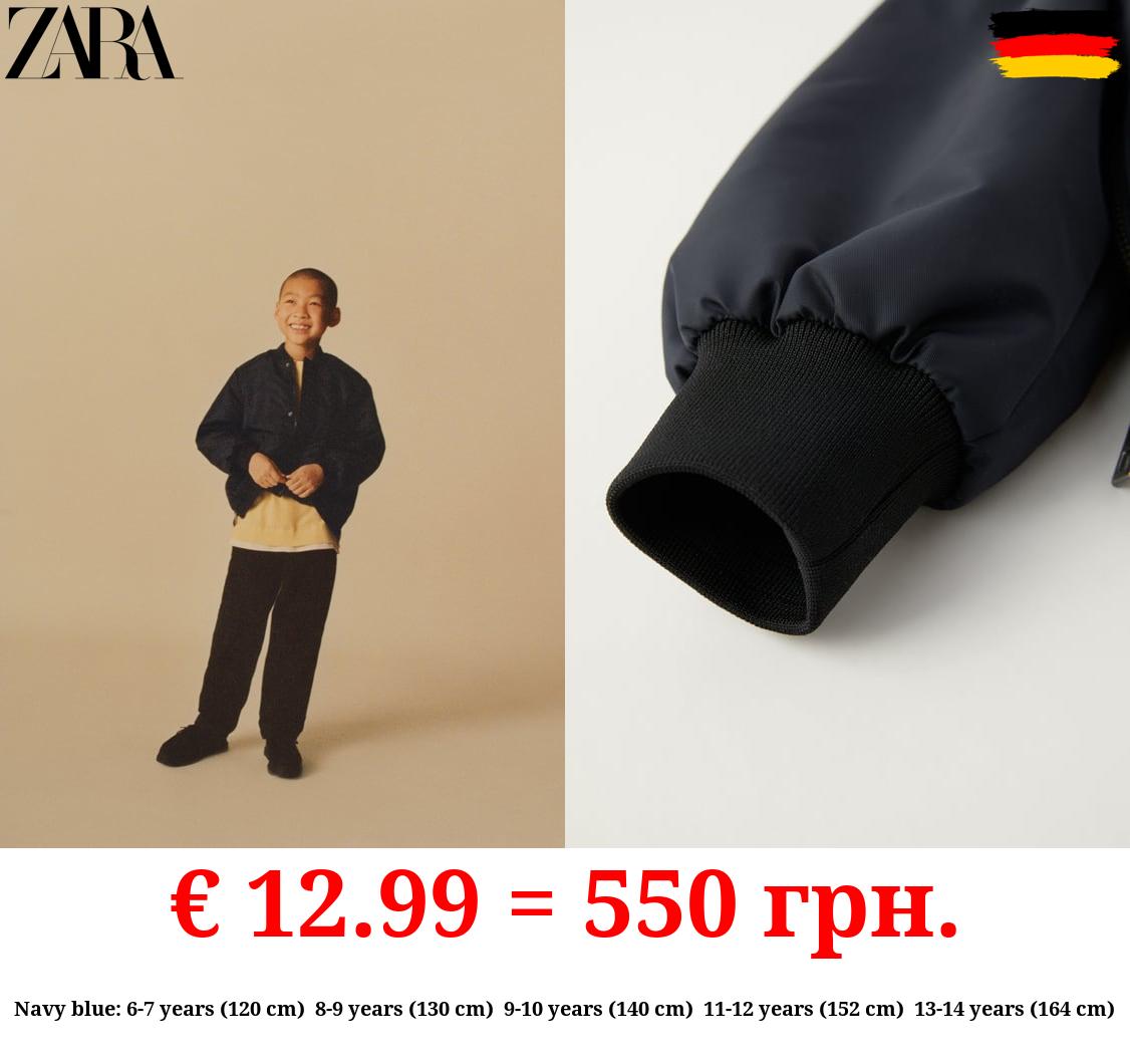 OVERSIZE BOMBER JACKET WITH ZIPS