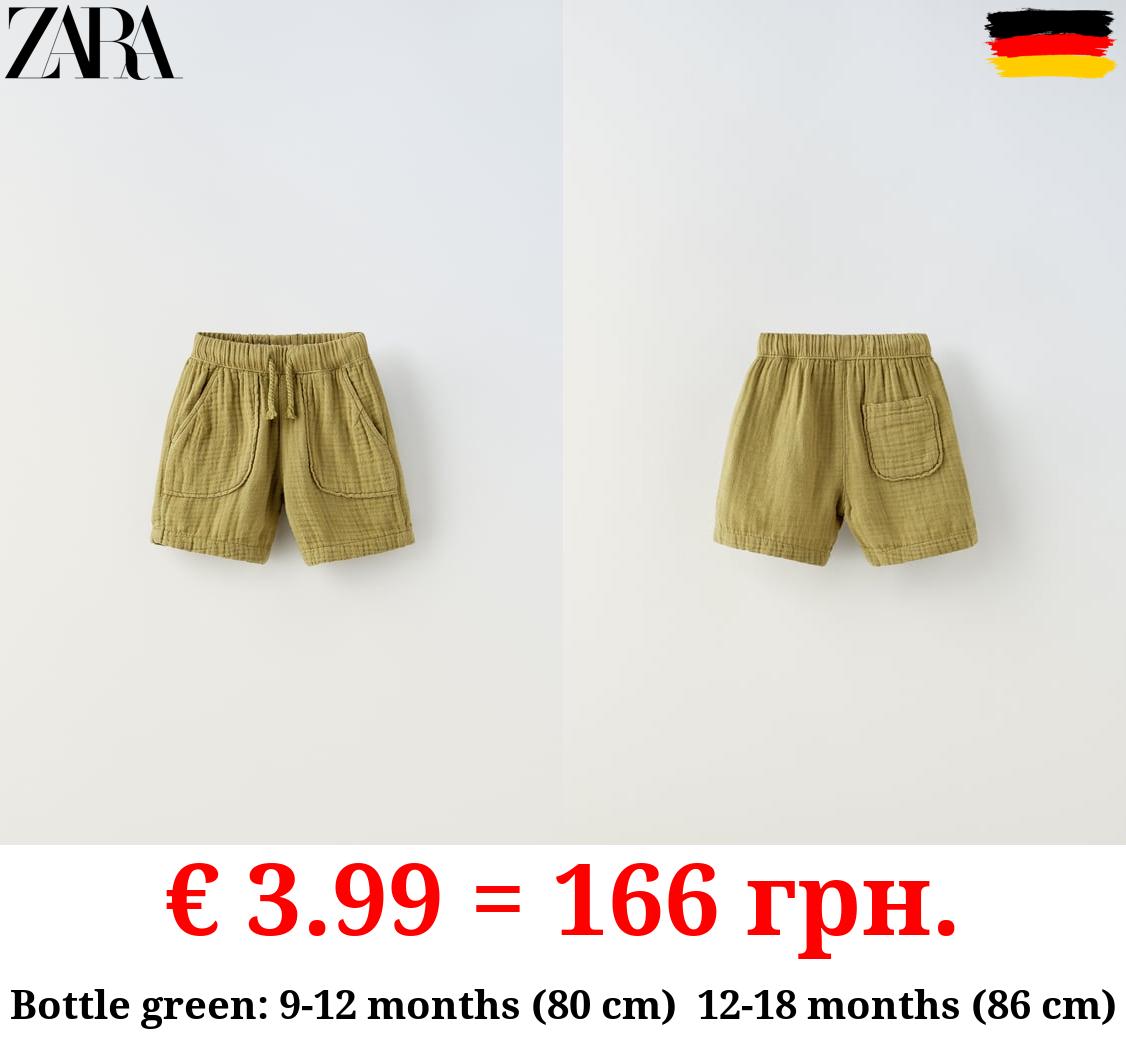 TEXTURED DRAWSTRING BERMUDA SHORTS