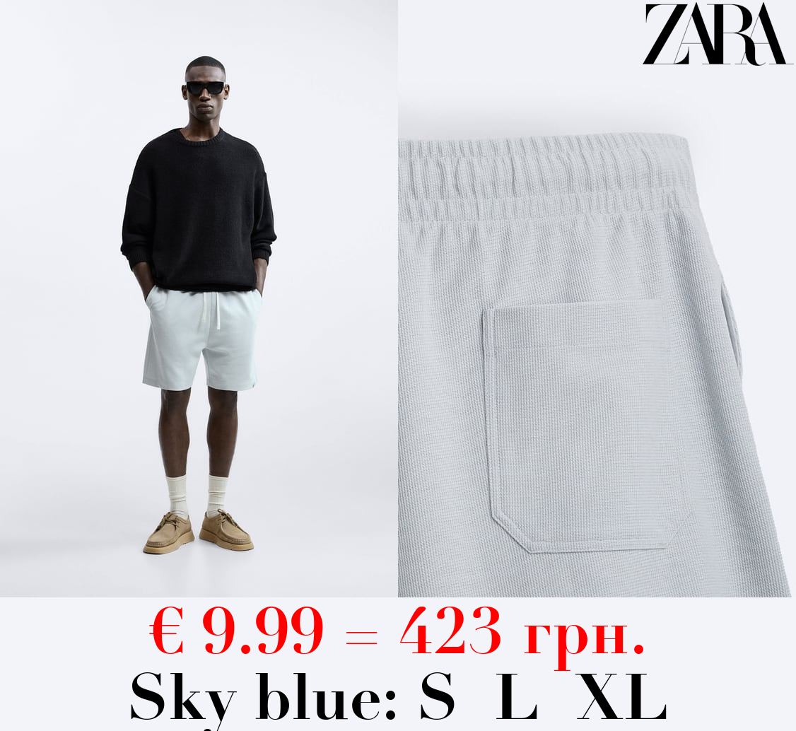 TEXTURED BERMUDA SHORTS WITH LABEL