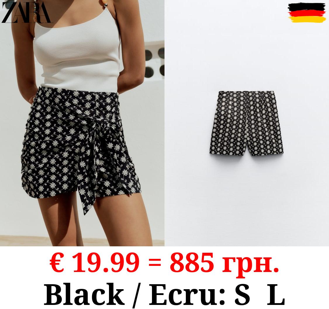 KNOTTED SKORT WITH CUTWORK EMBROIDERY