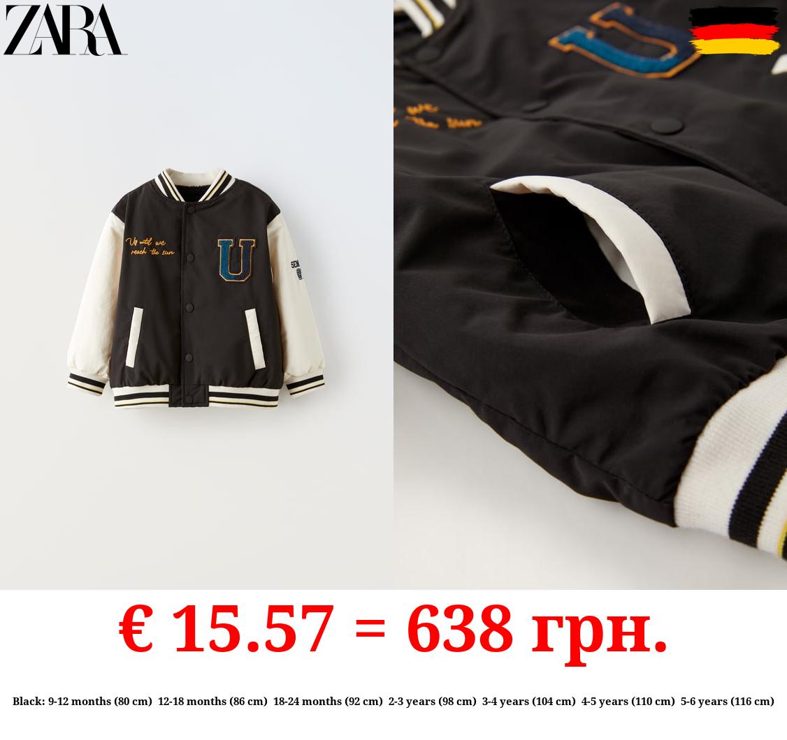 WATER-REPELLENT FAUX SHEARLING VARSITY BOMBER JACKET