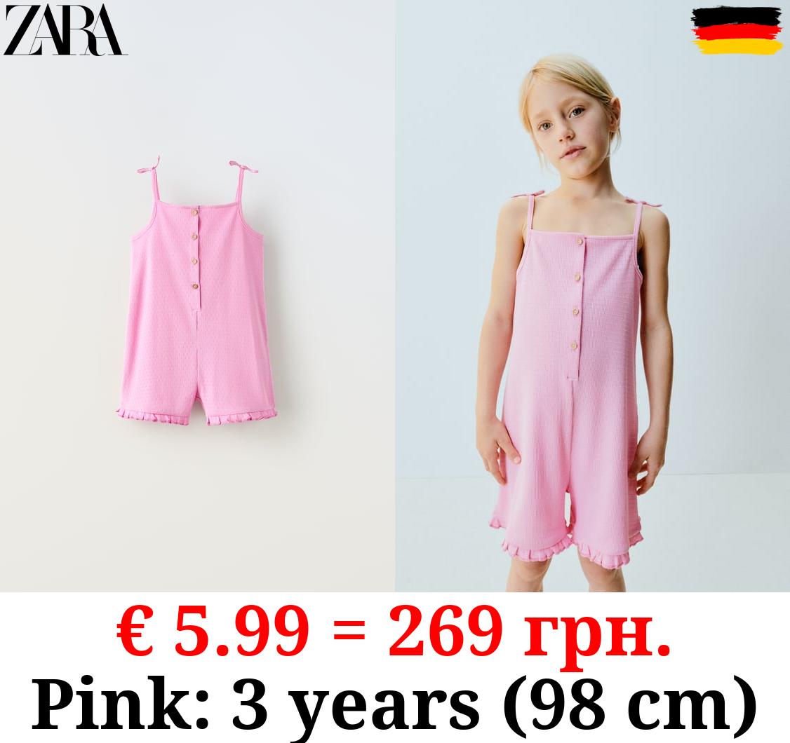 JUMPSUIT WITH BUTTONED STRAPS