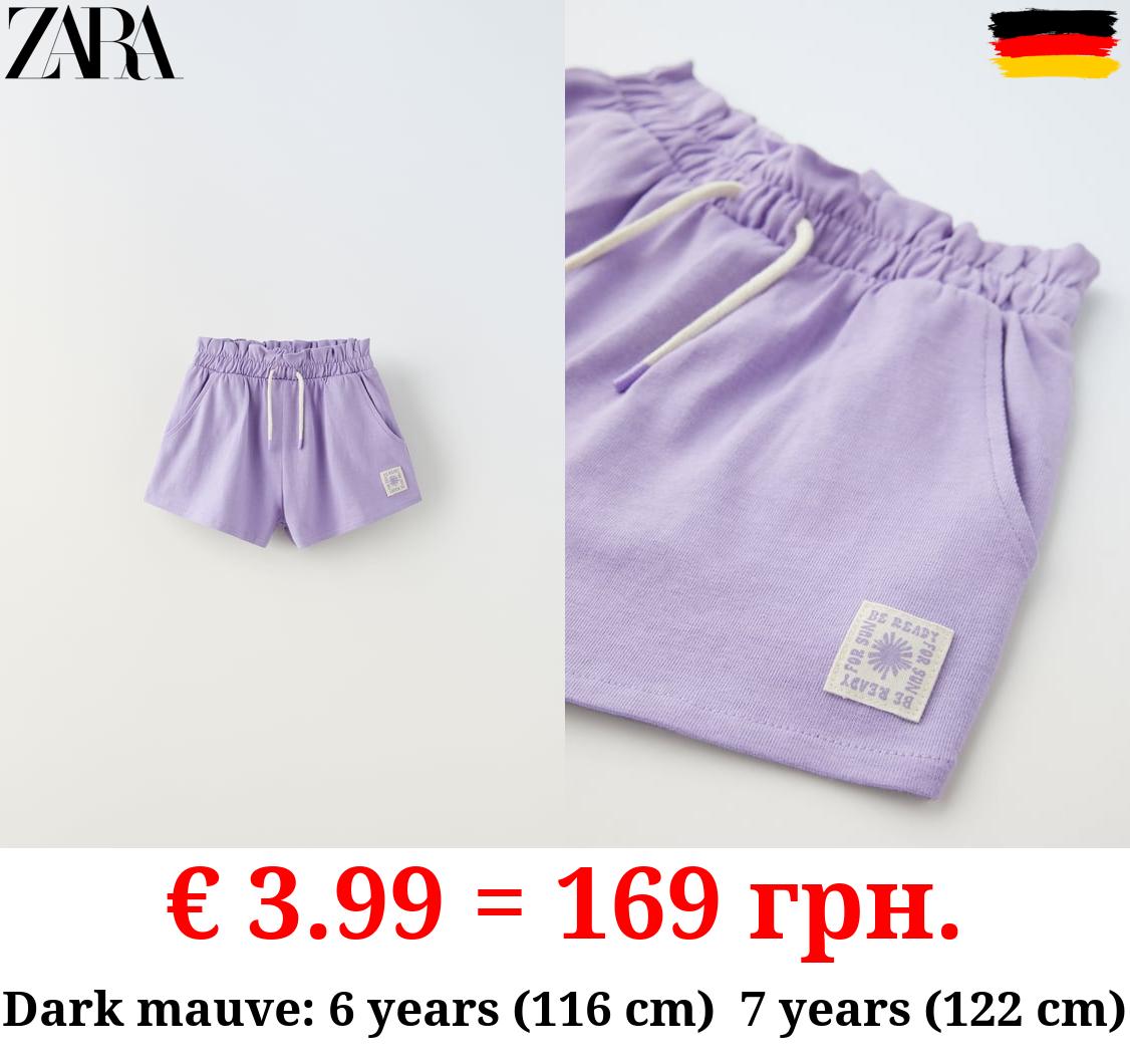 PLUSH BERMUDA SHORTS WITH LABEL DETAIL