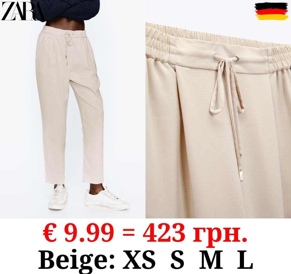 LOOSE-FIITING DRAWSTRING TROUSERS