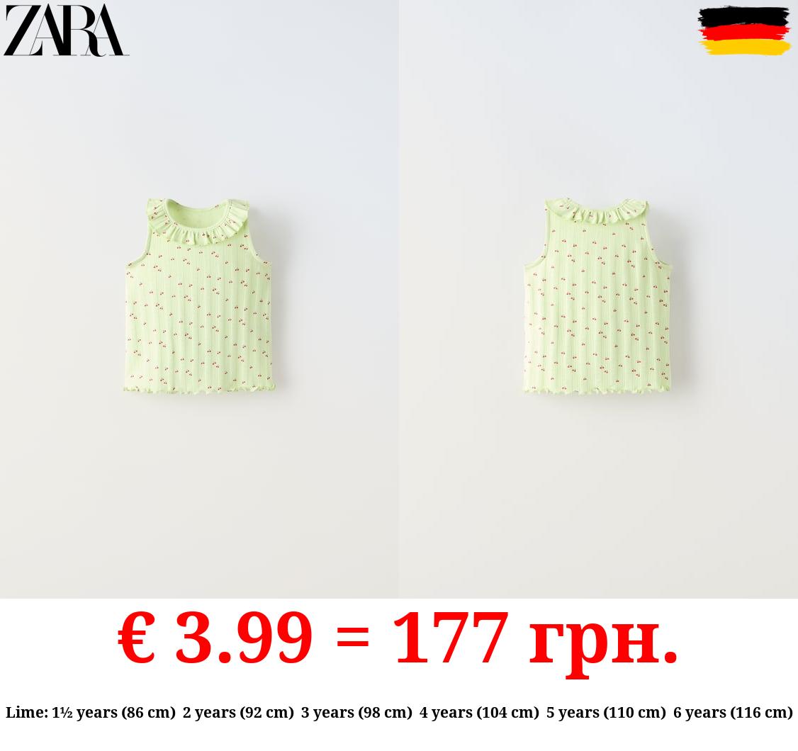 OPEN KNIT FLORAL T-SHIRT WITH RUFFLES