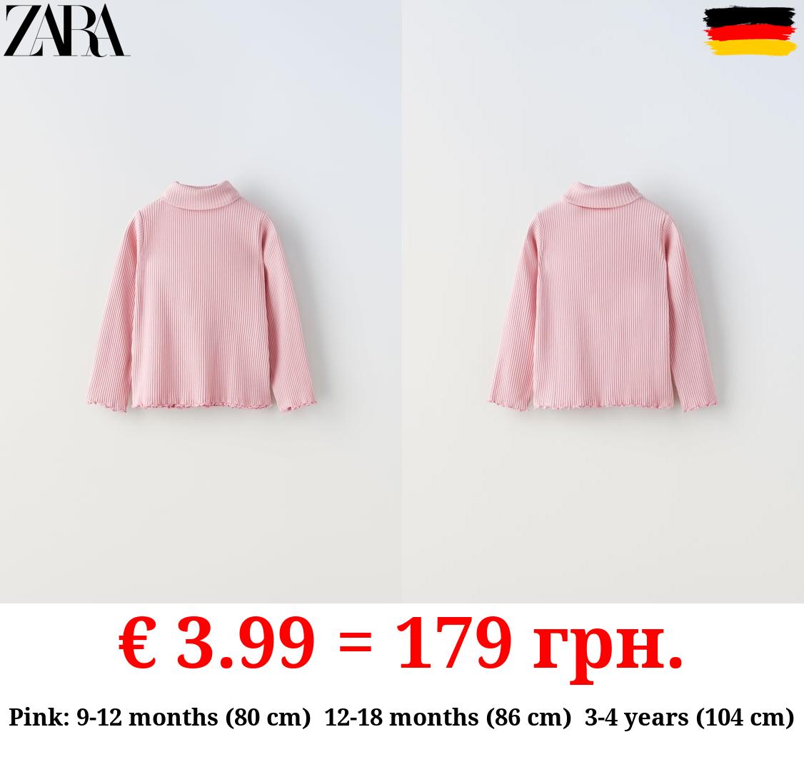 RIBBED TOP WITH SCALLOPED DETAILS