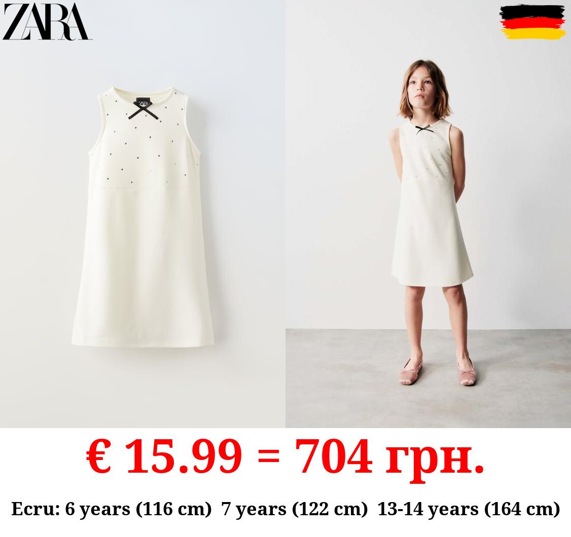 DRESS WITH BOW AND RHINESTONES