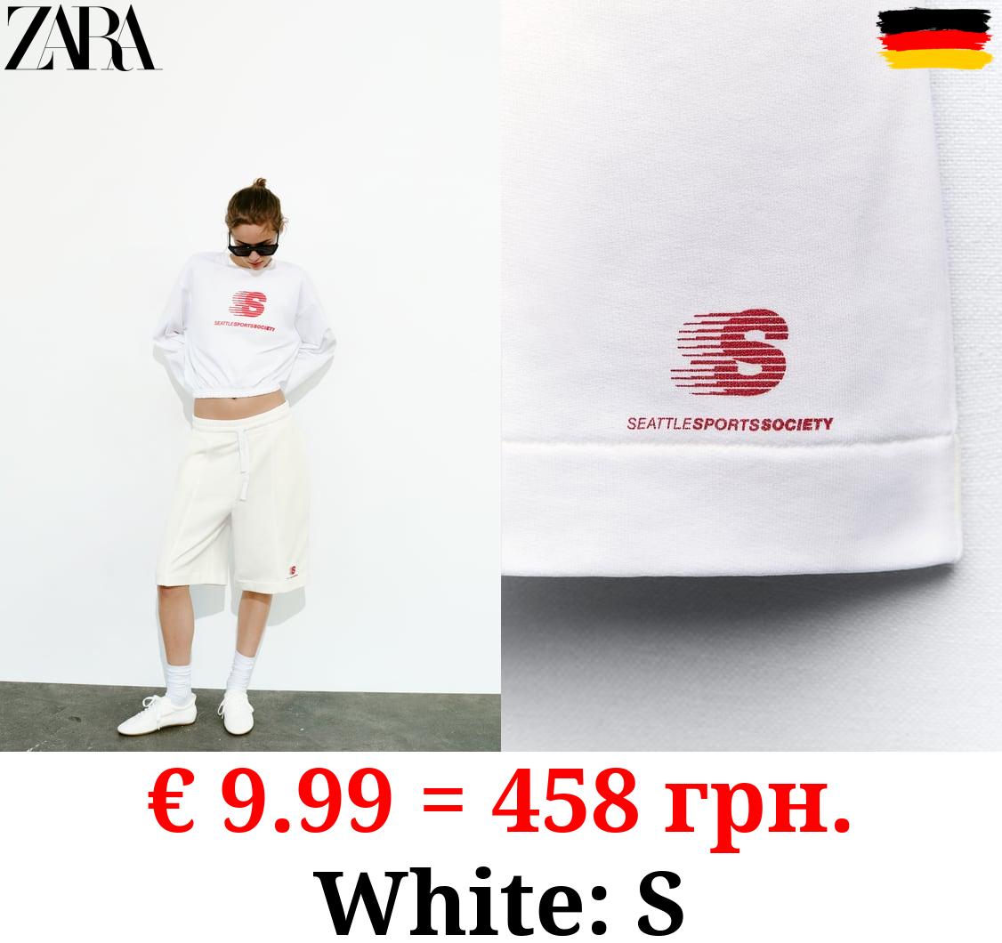 BERMUDA SHORTS WITH SLOGAN DETAIL