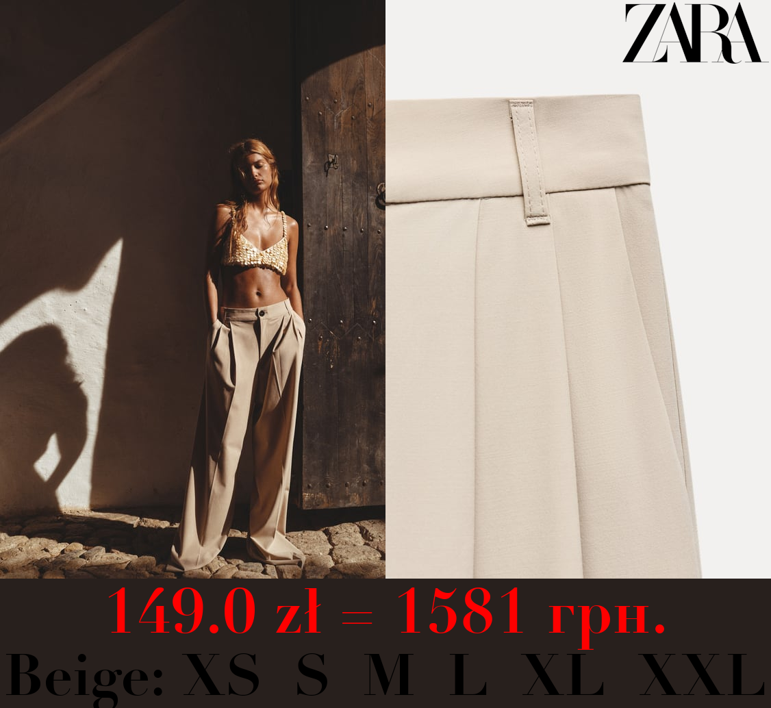PLEATED TROUSERS