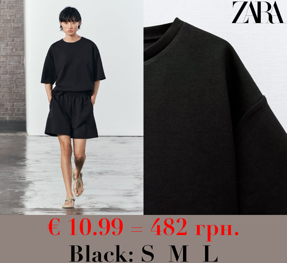 SHORT SLEEVE INTERLOCK SWEATSHIRT