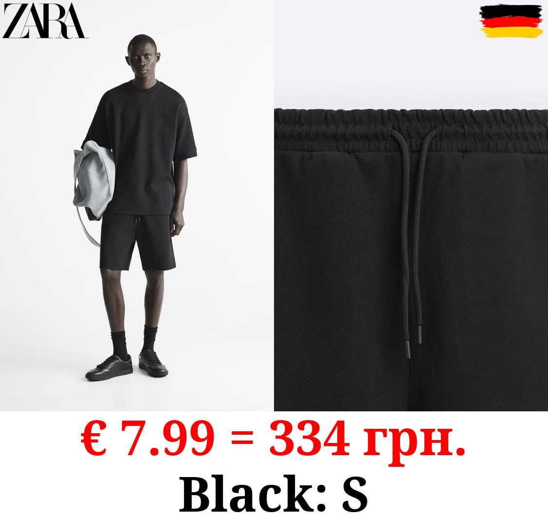 COMPACT JOGGER BERMUDA SHORTS