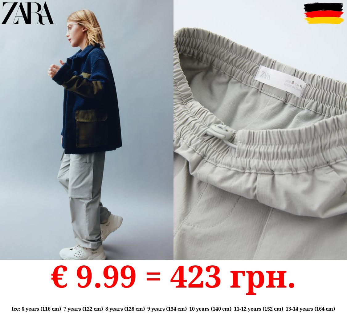 LINED NYLON TROUSERS