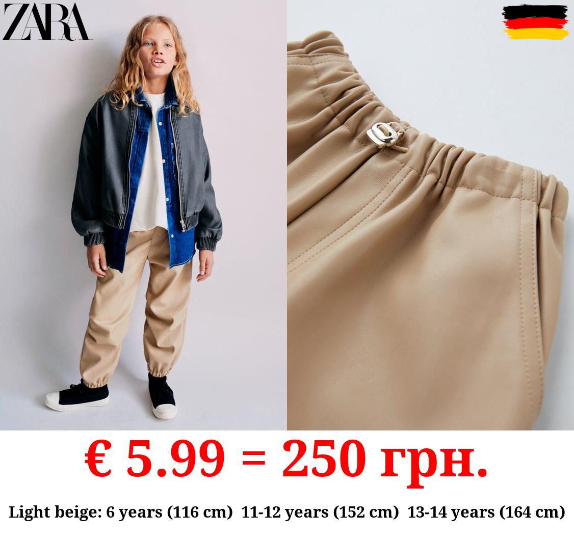 FAUX LEATHER PARACHUTE TROUSERS