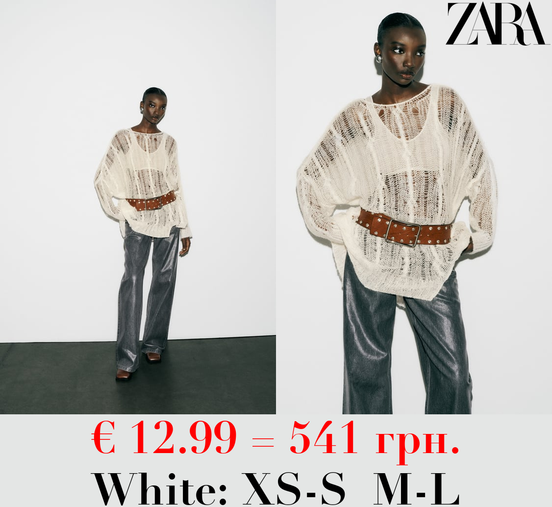 ASYMMETRIC OPEN CABLE-KNIT SWEATER