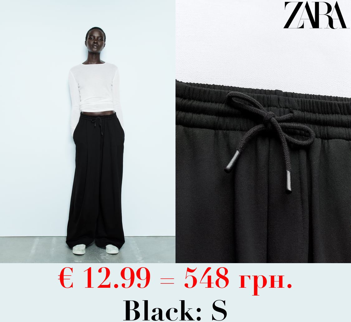 BROAD PLUSH TROUSERS