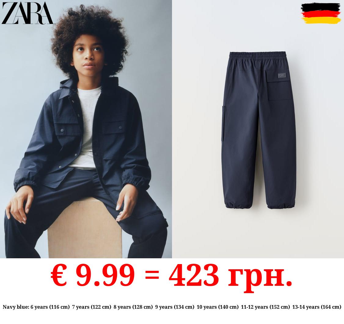 LINED NYLON TROUSERS