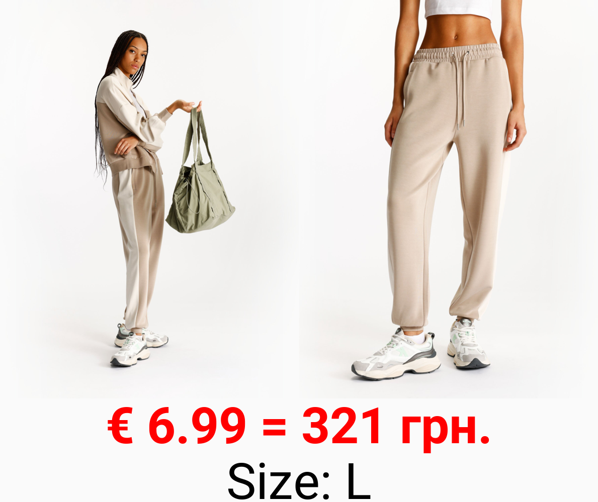 Tracksuit bottoms with side taping