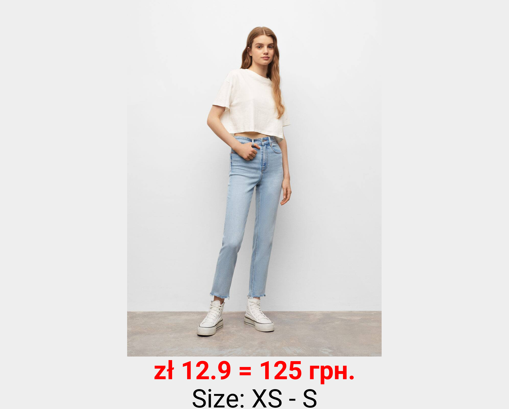 Jeans slim bajo deshilachado