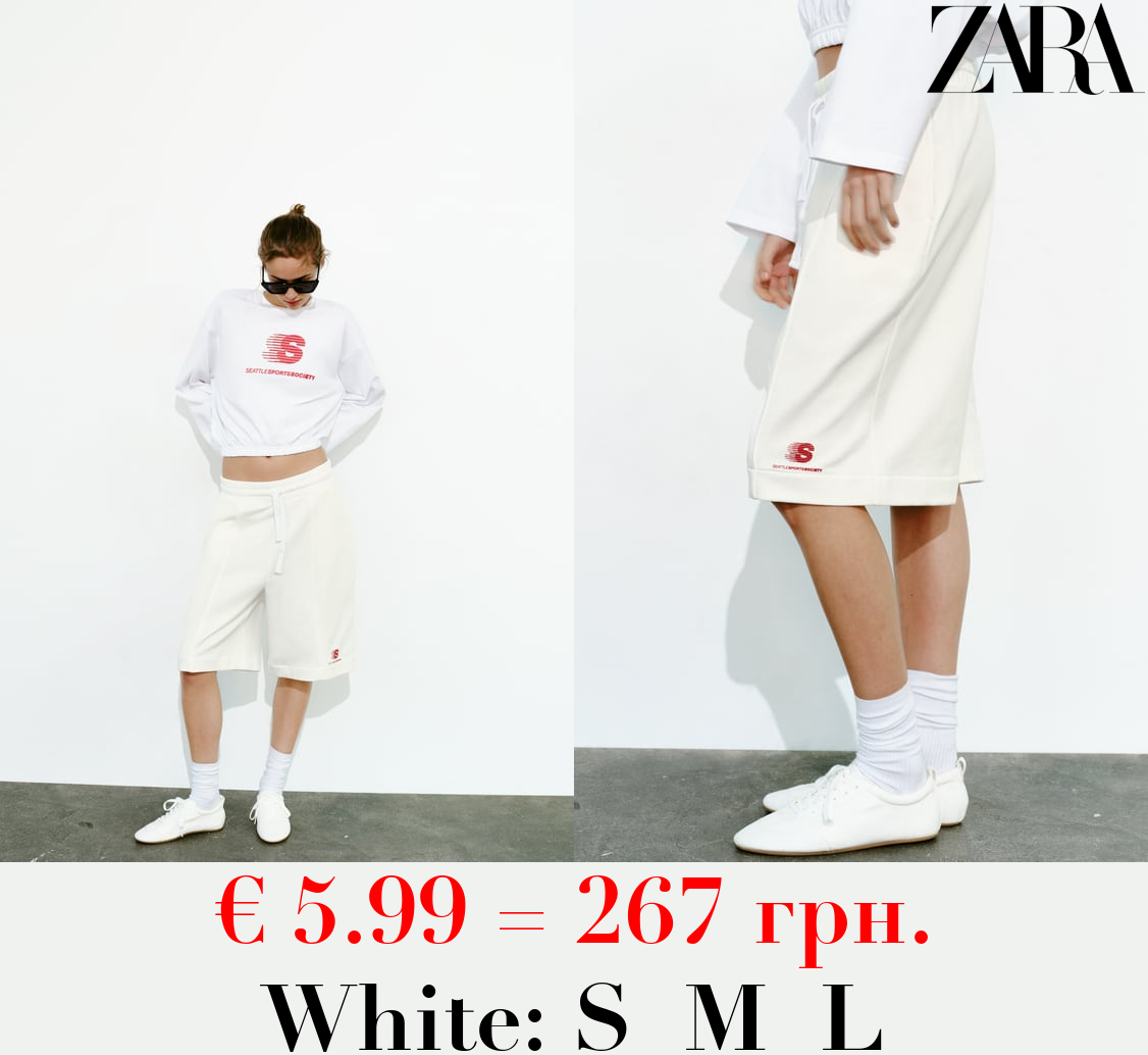 BERMUDA SHORTS WITH SLOGAN DETAIL