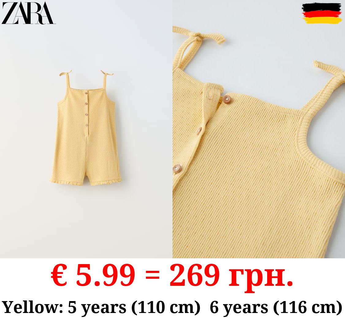 JUMPSUIT WITH BUTTONED STRAPS