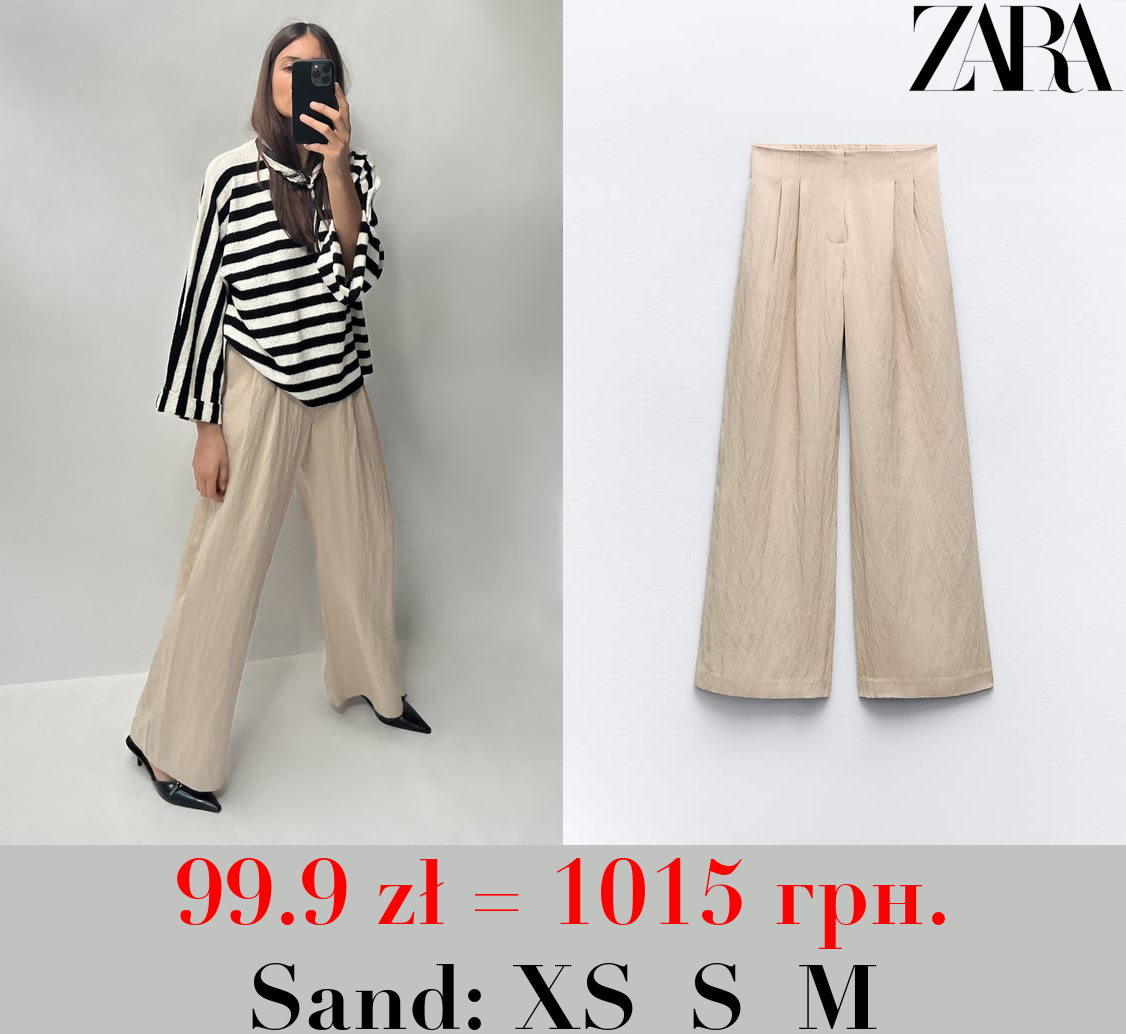 LOOSE FIT PLEATED TROUSERS