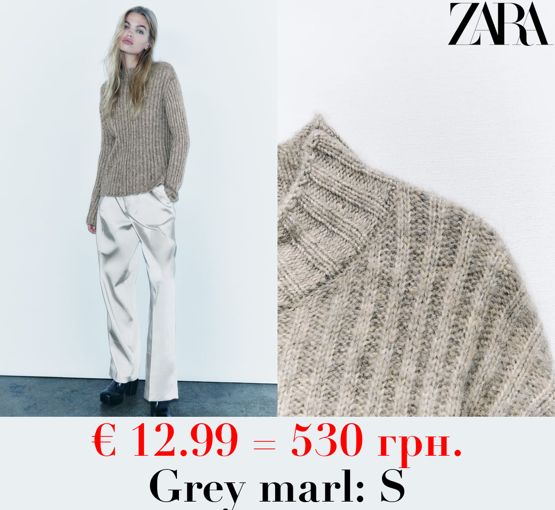 RIBBED KNIT SWEATER WITH CENTRAL SEAM