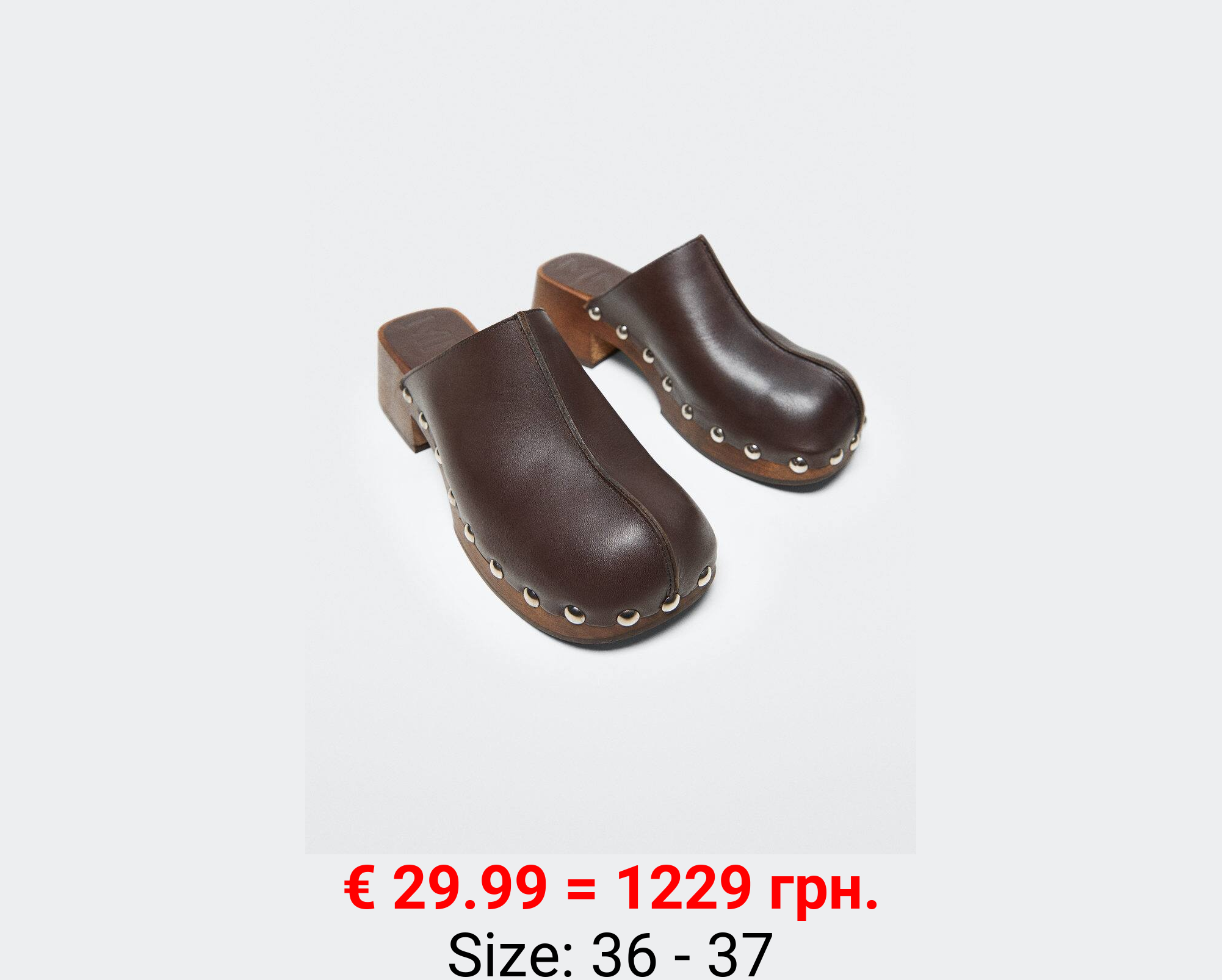 Zueco piel tachuelas