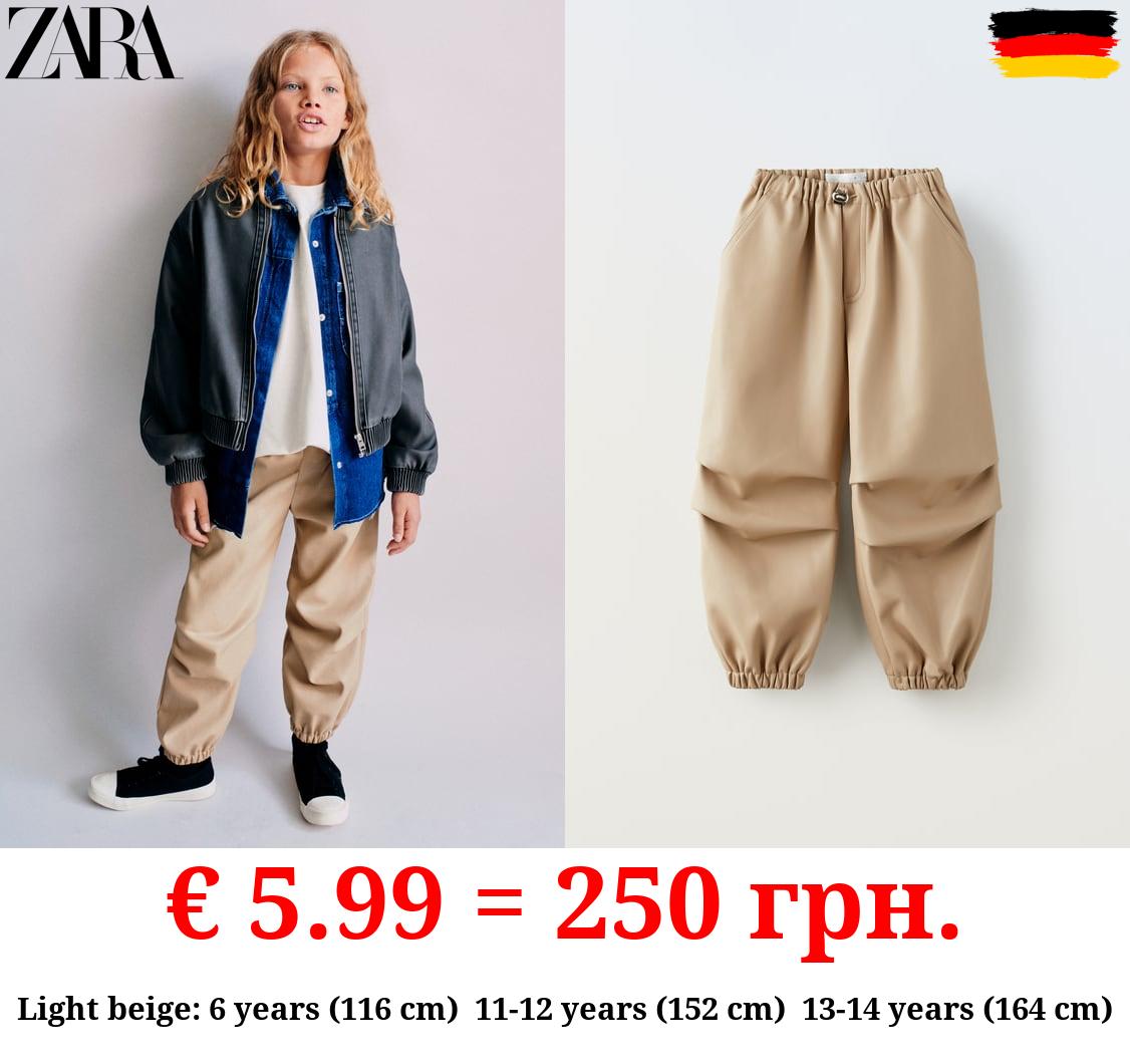 FAUX LEATHER PARACHUTE TROUSERS