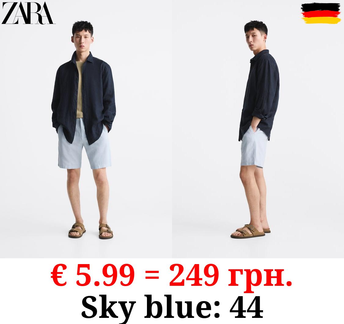 TEXTURED OXFORD BERMUDA SHORTS